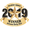 A gold star with the words readers choice 2019