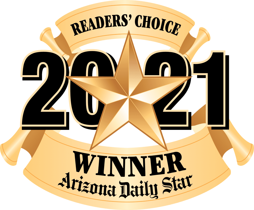 A gold star with the words readers choice 2021